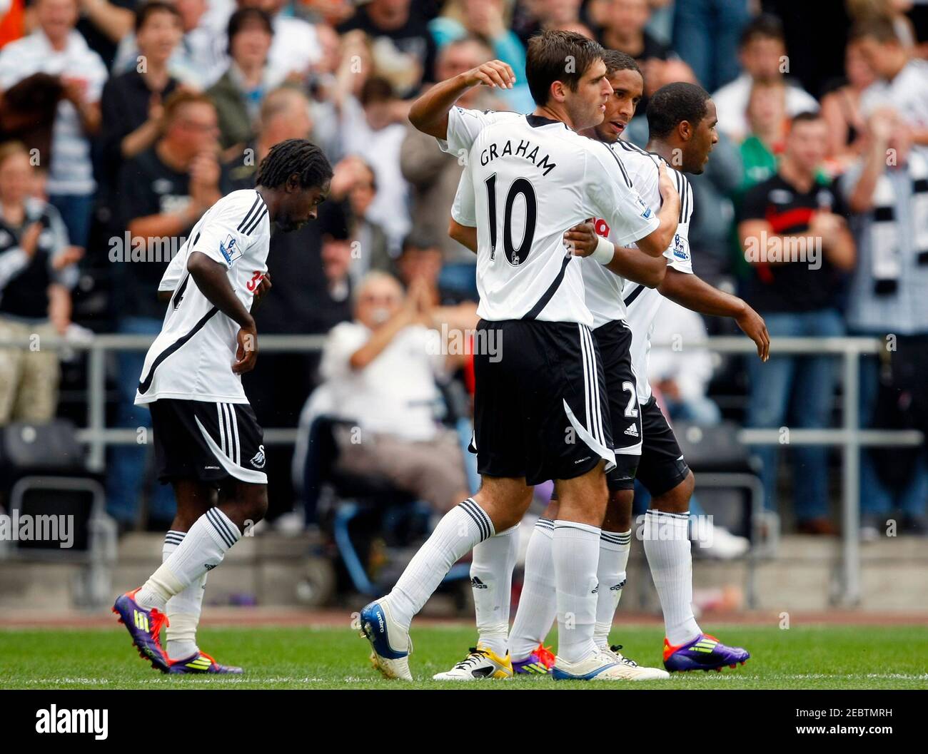 Calcio - Swansea City v Real Betis Pre Season friendly - Liberty Stadium -  6/8/11 Danny Graham (C) celebra il primo gol per Swansea con Ashley  Williams, Nathan Dyer (L) e i