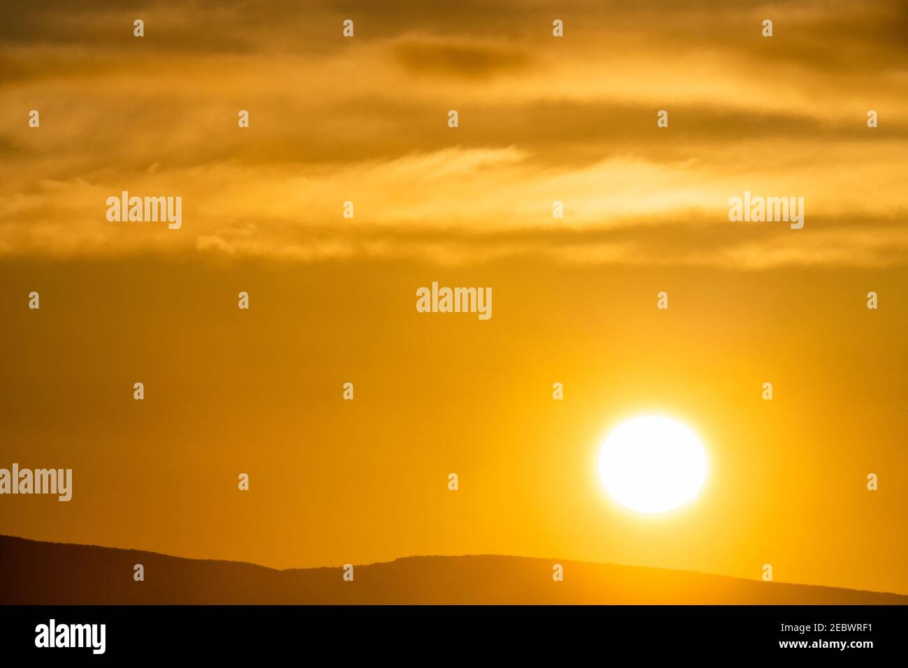 USA, Idaho, Bellevue, Gold alba cielo su colline Foto Stock