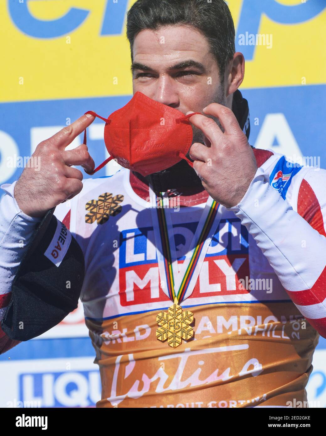 VertIGINE, Cortina (BL), Italia, 14 Feb 2021, Vincent Kriechmayr austriaco posa sul podio con le sue Medaglie d'oro durante i Campionati mondiali DI SCI alpino 2021 FIS - Downhill - uomini, gara di sci alpino - Foto Franco Debernardi / LM Foto Stock