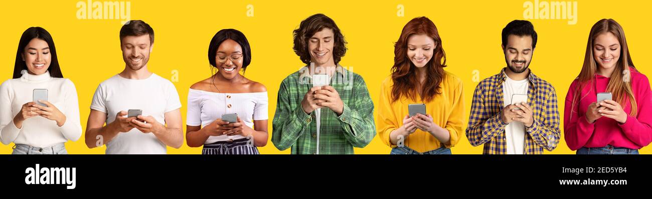 Giovani uomini e donne di razze diverse che usano internet su smartphone, controllando i social media, studiando online Foto Stock