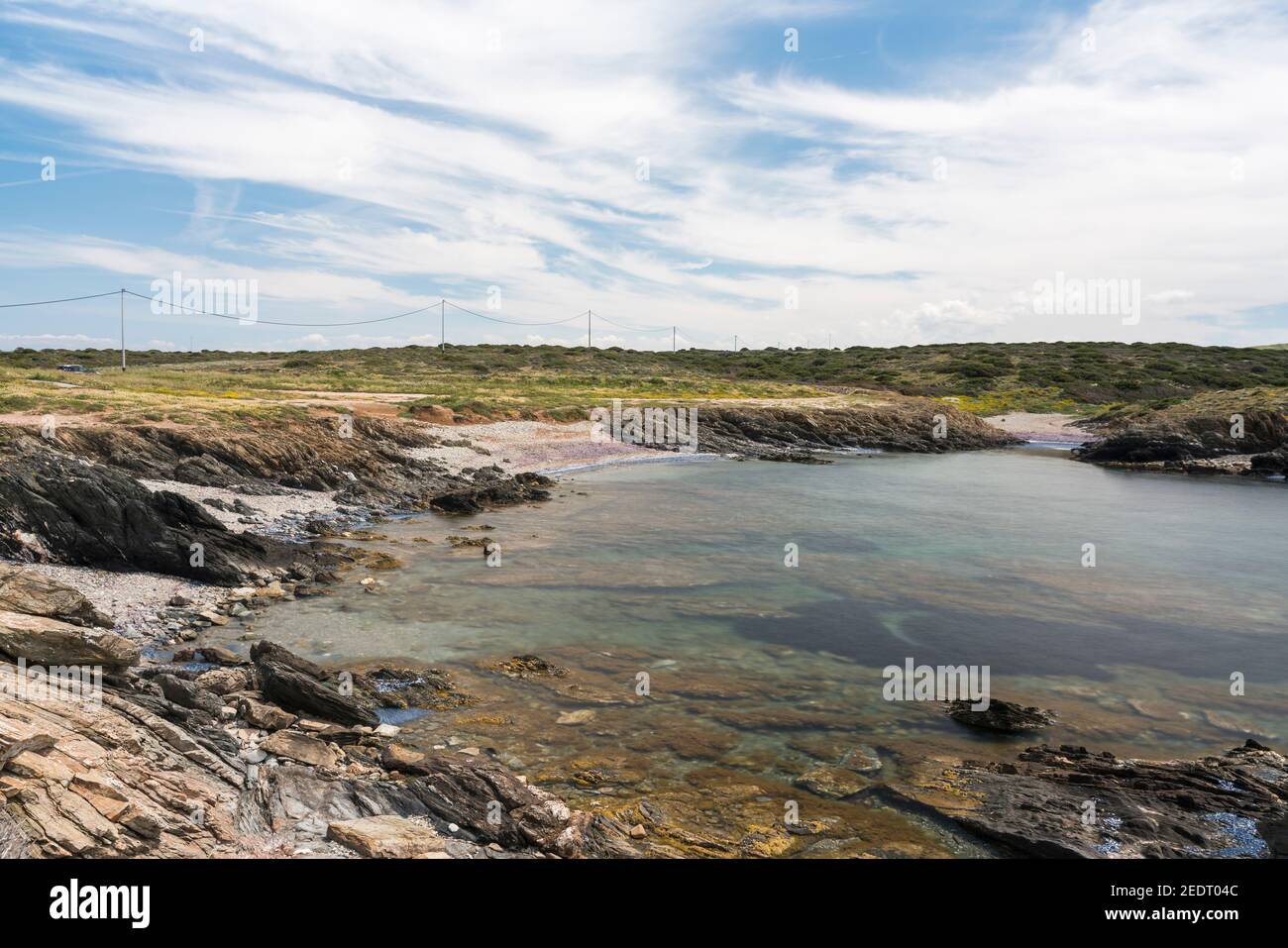 Una vista su Cala coscia di Donna su un soleggiato giorno Foto Stock