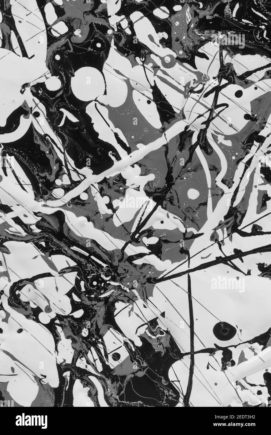 Vernici a base di olio e acqua immiscibili che non si mescolano Insieme utilizzato in un dipinto stile Jackson Pollock per presentare interazione e repulsione Foto Stock