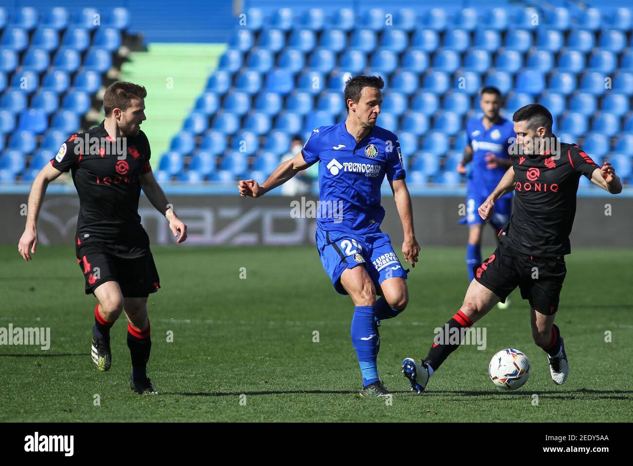 Asier Illarramendi di Real Sociedad, Nemanja Maksimovic di Getafe CF e Joseba Zaldua di Real Sociedad in azione durante la cha / LM spagnola Foto Stock