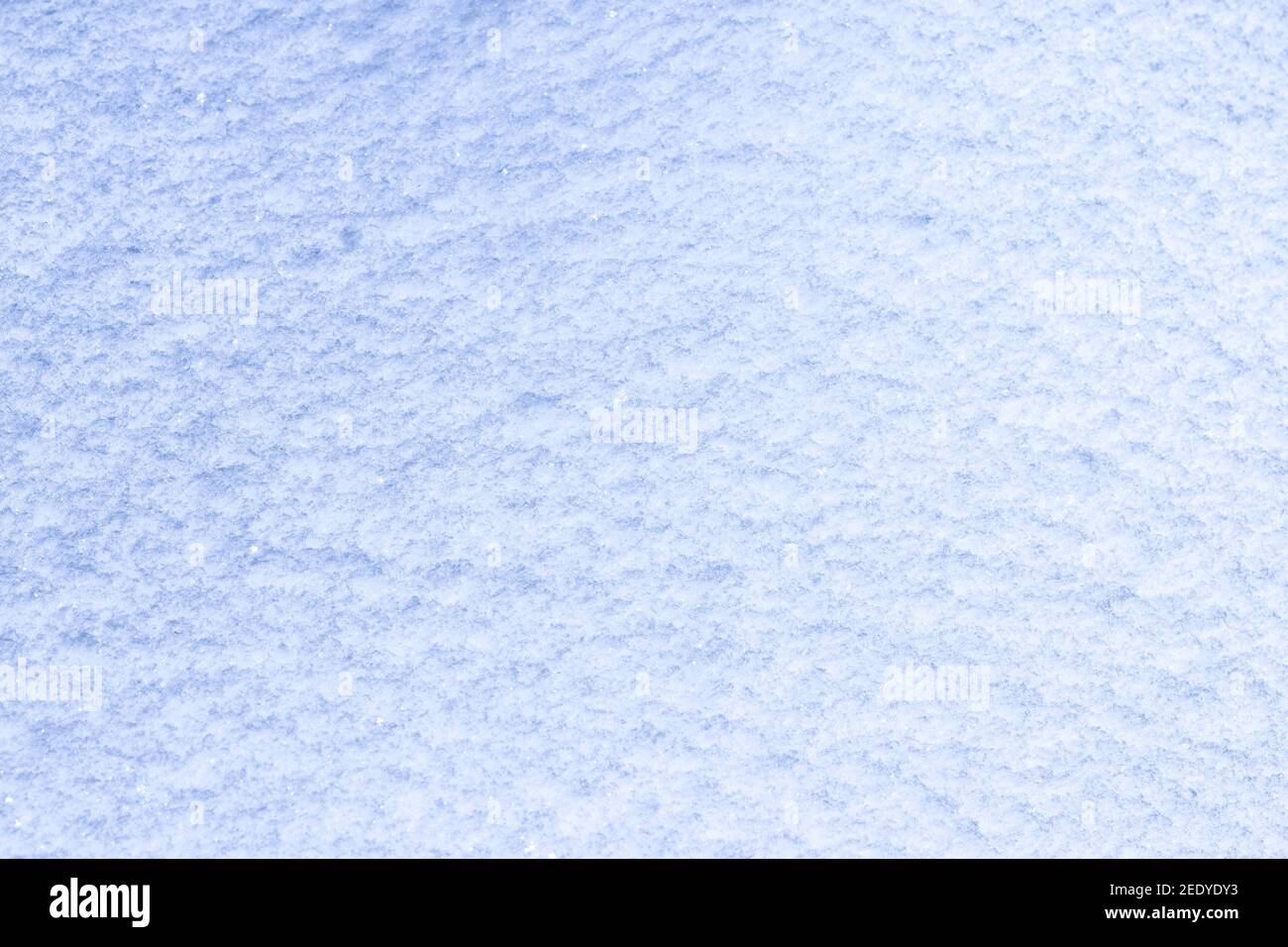 Inverno neve coprire texture sfondo. Fresco fondo di neve. Paesaggio coperto di neve. Fiocco di neve testurizzato dal ghiaccio Foto Stock
