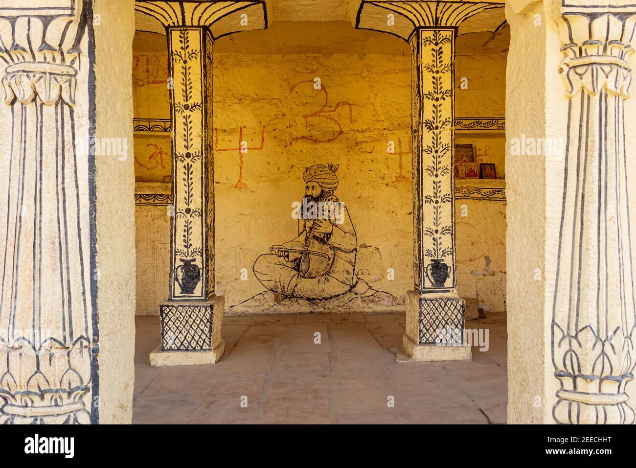 Pittura di uomo che gioca strumento tradizionale di Rajasthan, Jaisalmer, Rajasthan, India. Foto Stock