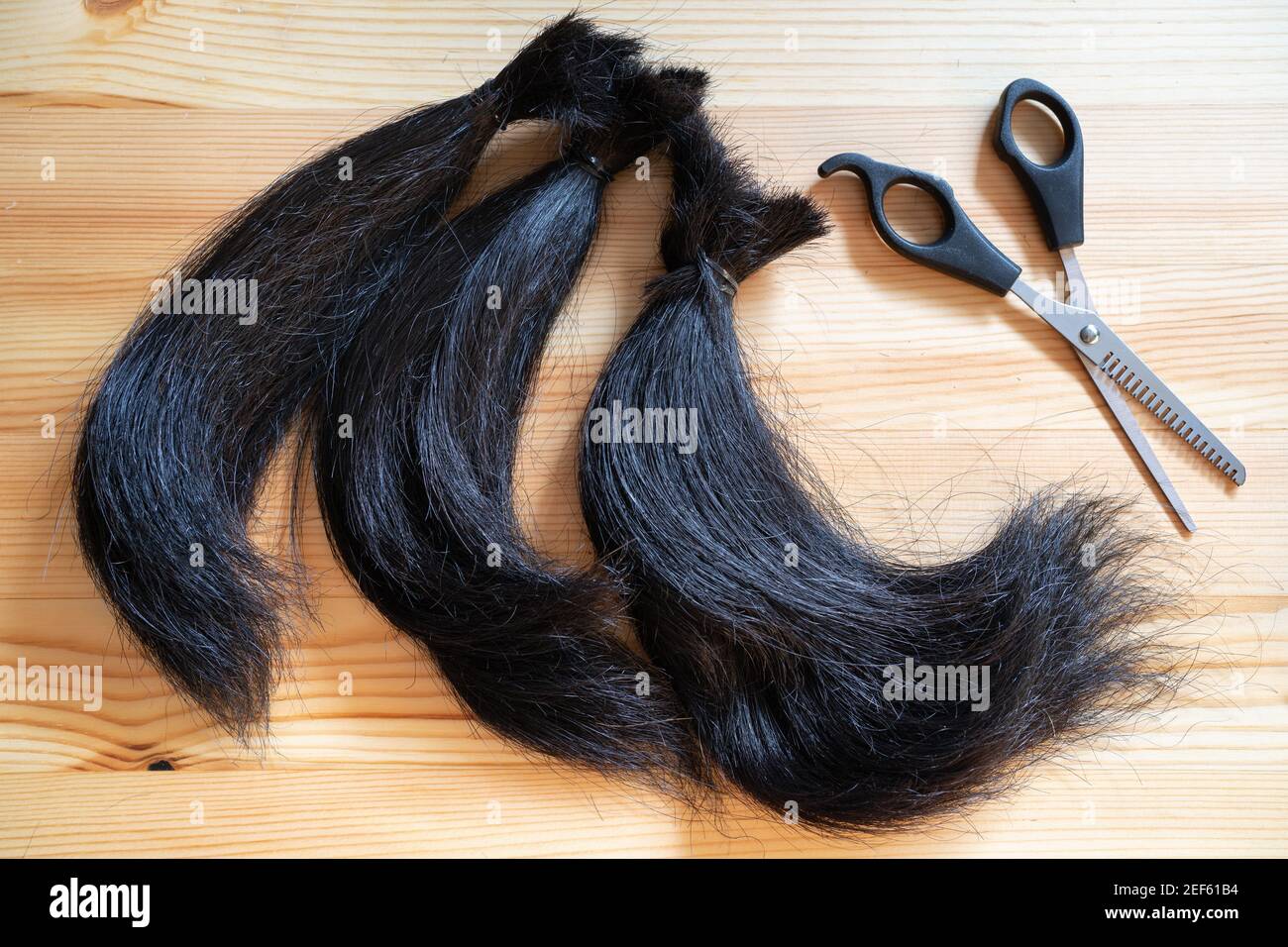 Ciocche di capelli da donare per il cancro paziente da fare una parrucca Foto Stock