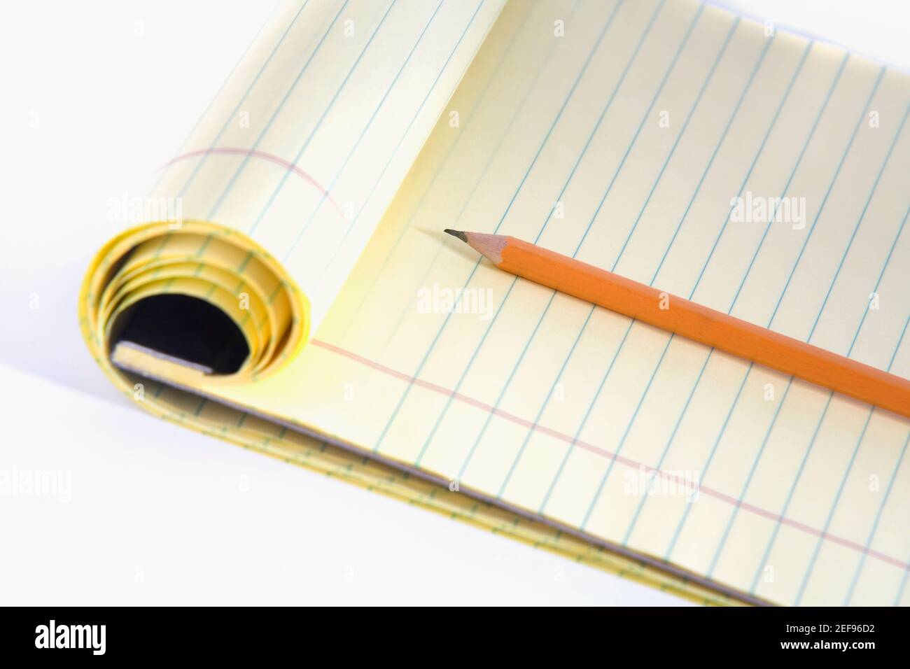 Primo piano di una matita su un blocco note Foto Stock
