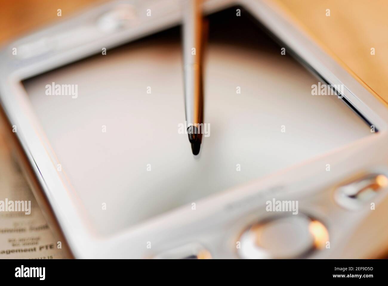 Close-up di un assistente di dati personale con una penna digitalizzata Foto Stock