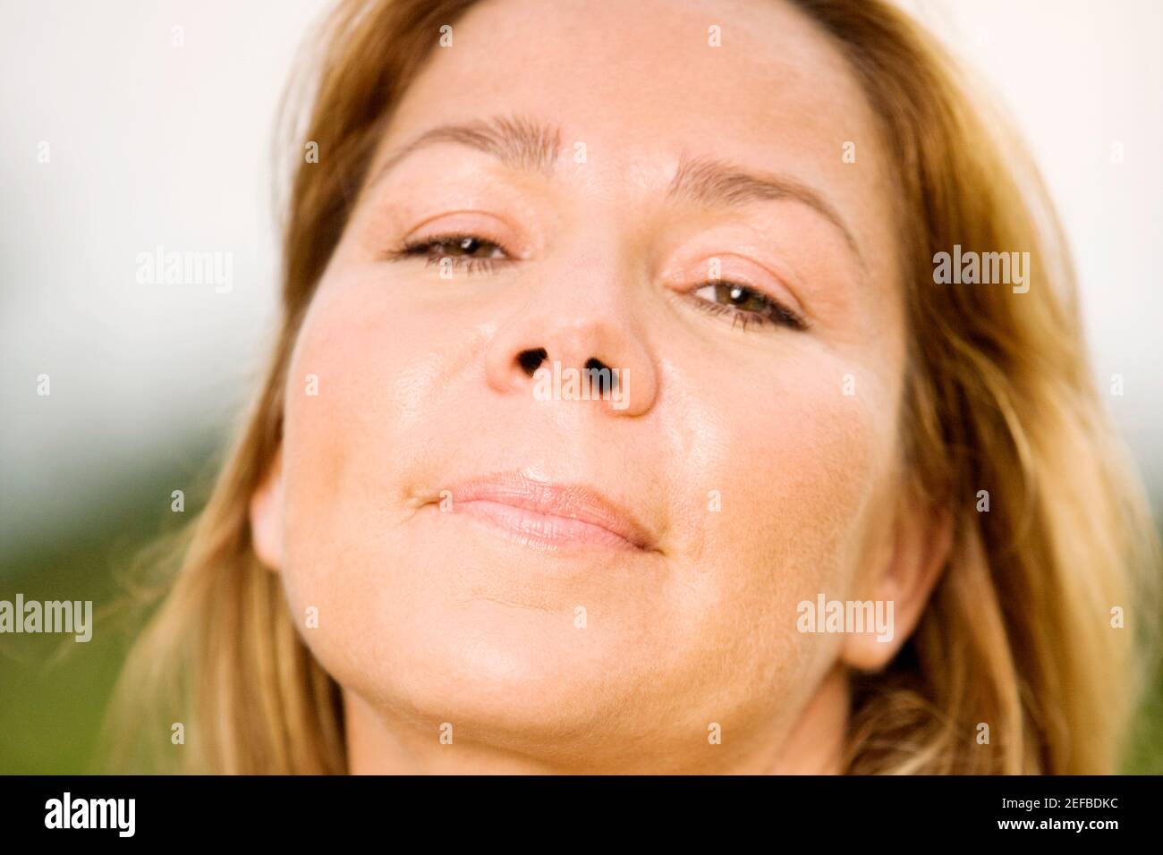 Ritratto di una donna matura pensando Foto Stock