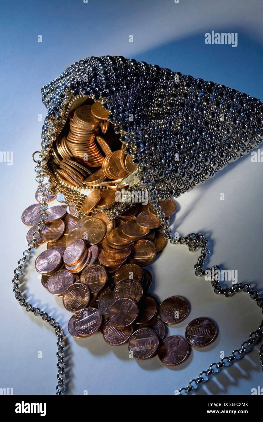 Monete in una borsa Foto Stock