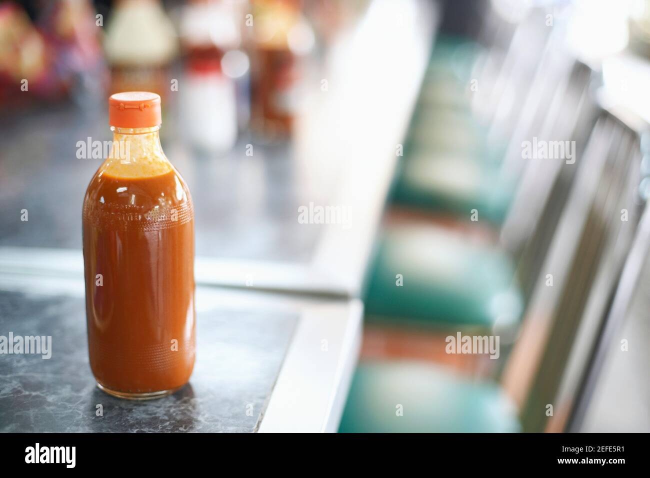 Primo piano di una bottiglia di ketchup Foto Stock