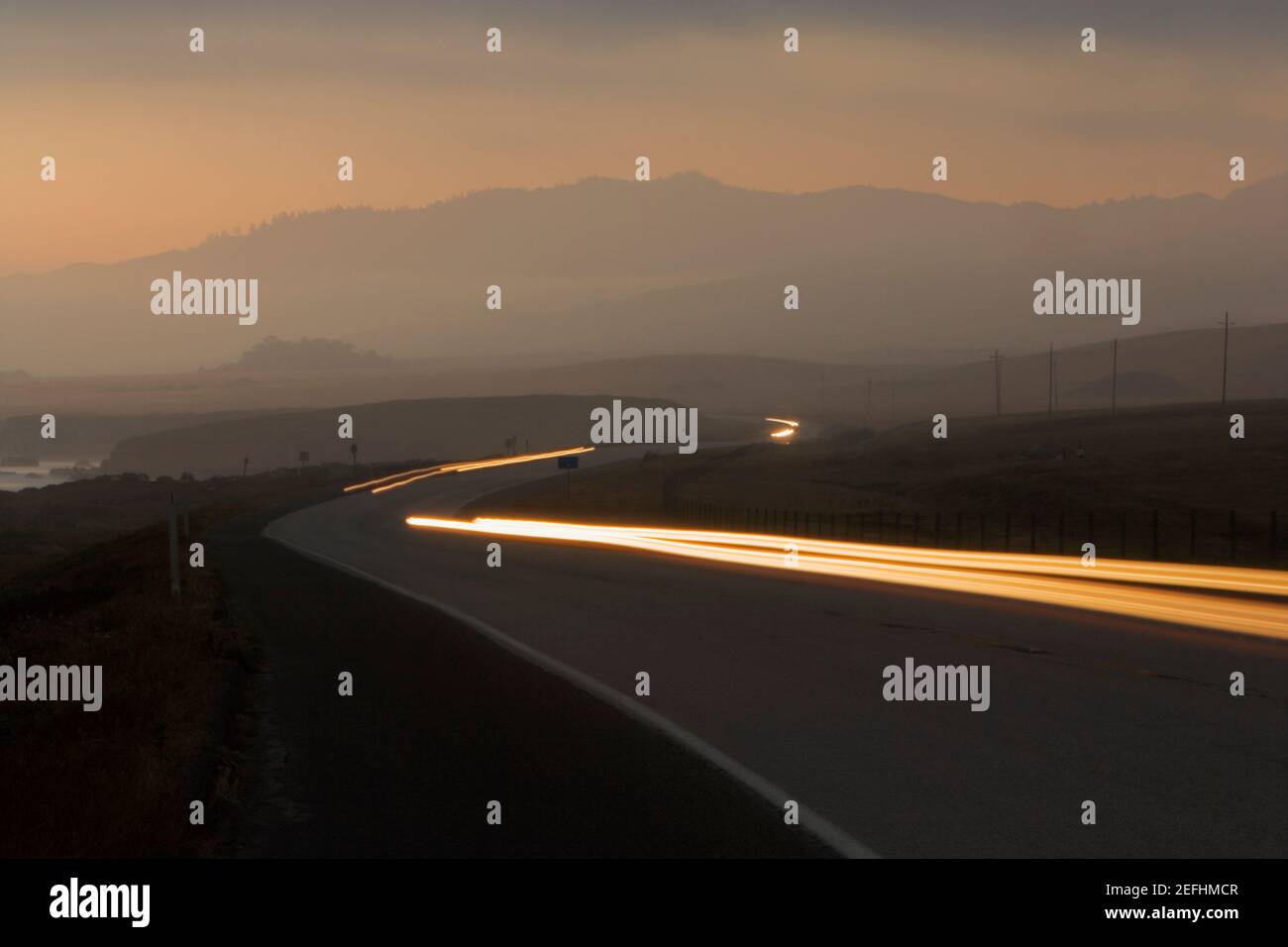 Luce di coda dei veicoli di notte Foto Stock