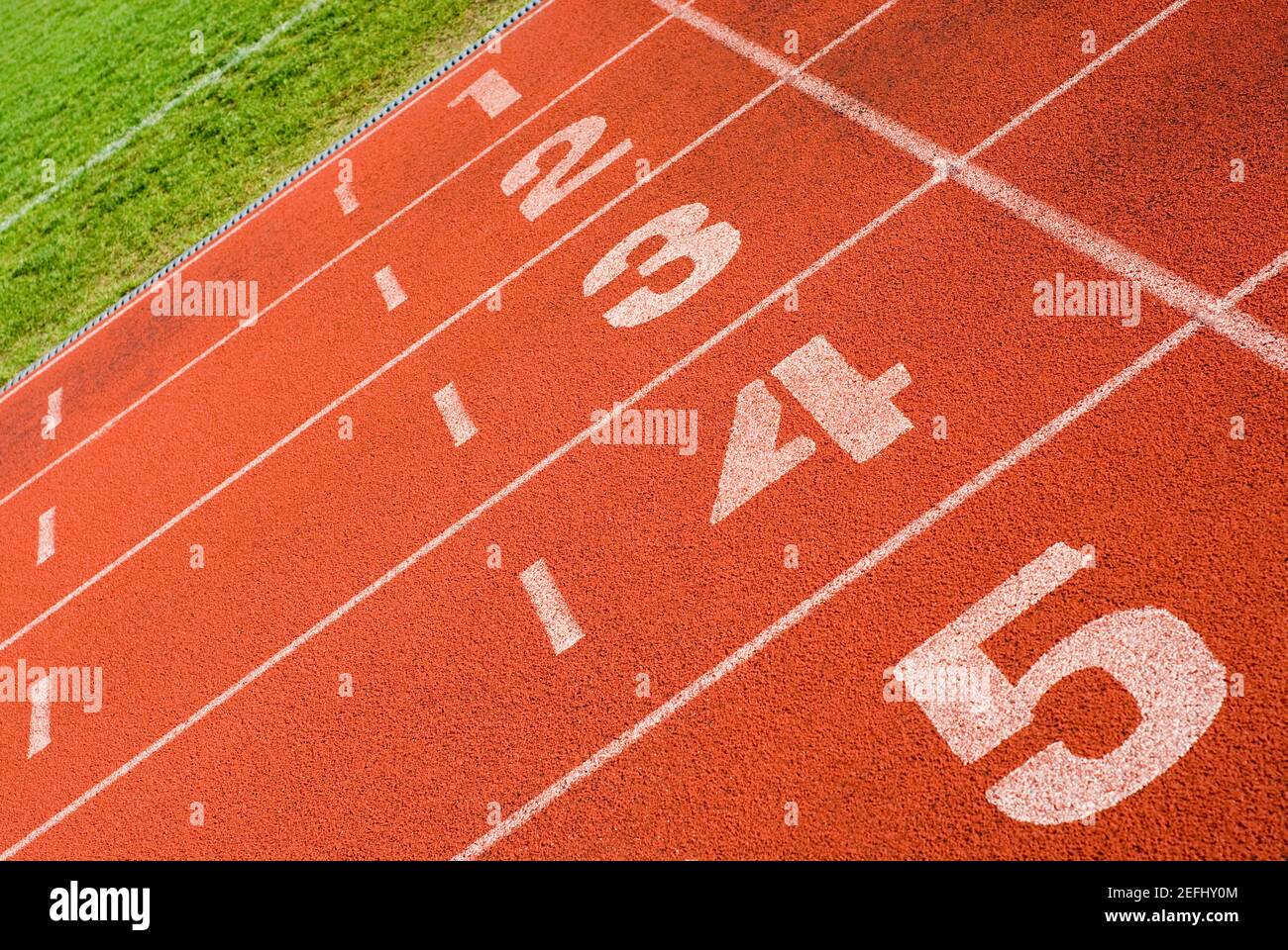 Close-up di via i numeri su una via di corsa Foto Stock