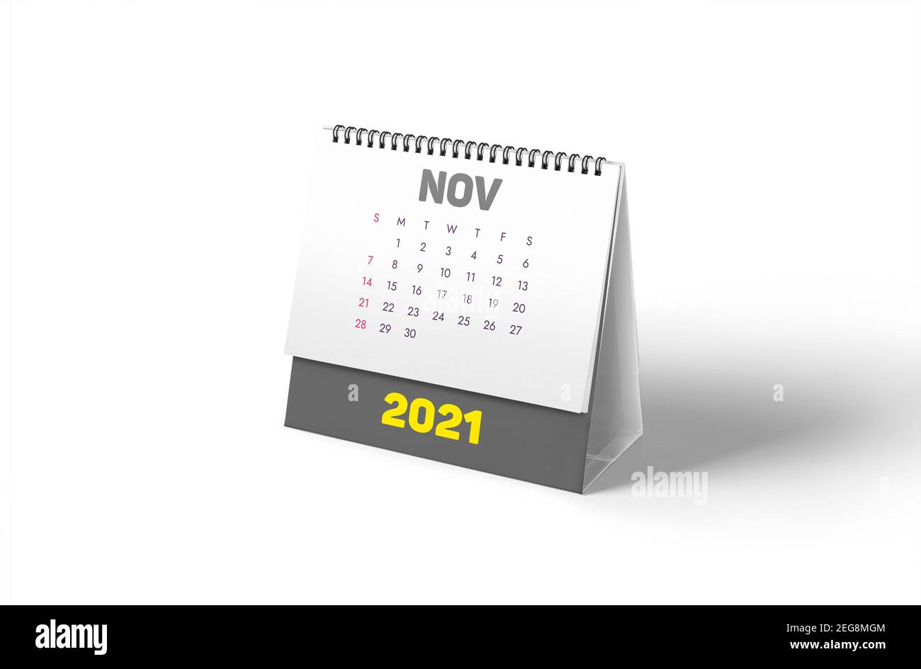 Concetto di calendario da tavolo a spirale grigio e giallo 2021: Pianificatore mensile con rendering 3D isolato per novembre su sfondo bianco con ombre morbide. Foto Stock