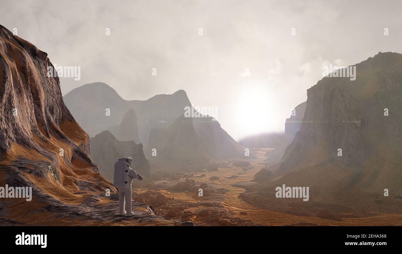 Astronauta sul pianeta Marte guardando il Rising Sun Foto Stock