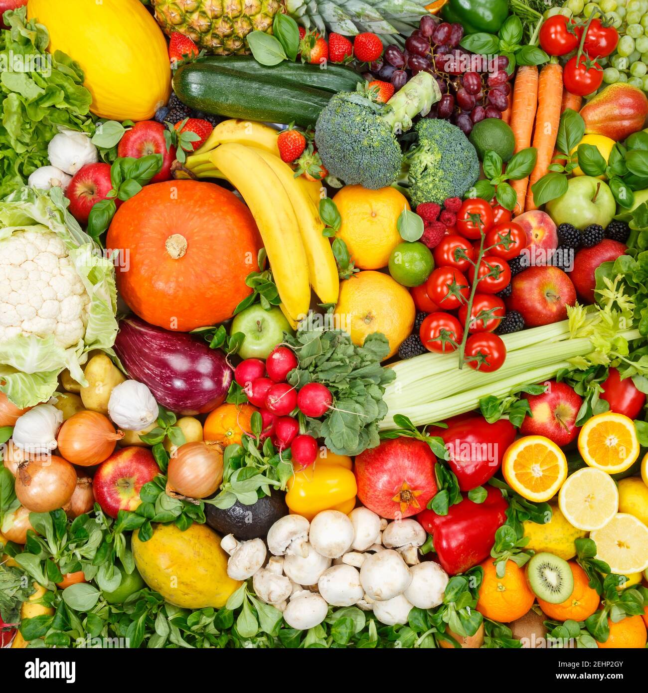Cibo di fondo frutta e verdura raccolta mele quadrate arance pomodori frutta ortaggi sfondi Foto Stock