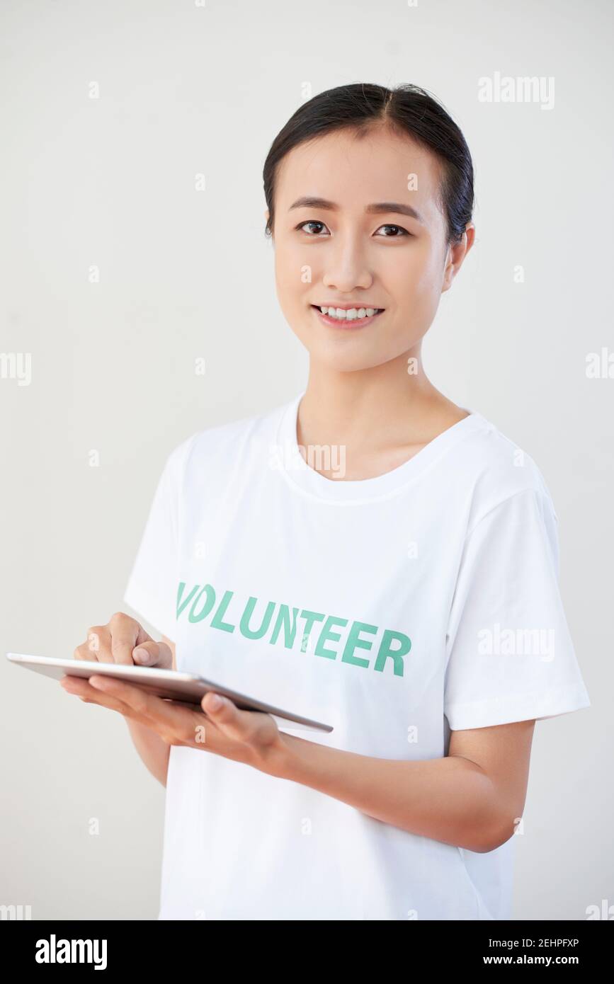 Membro sorridente dell'organizzazione di volontariato Foto Stock