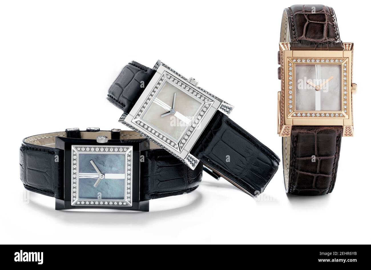 Tre orologi da polso da donna con quadrante a rombo rettangolare e  cinturino in pelle nera, isolati su sfondo bianco Foto stock - Alamy