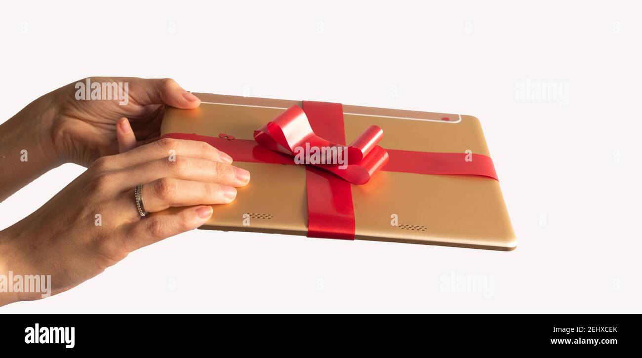 compressa confezionata in regalo con arco rosso e ornamenti di fondo Foto Stock