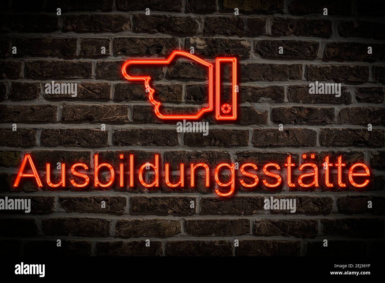 Foto di dettaglio di un cartello al neon su una parete con L'iscrizione Ausbildungsstätte Foto Stock