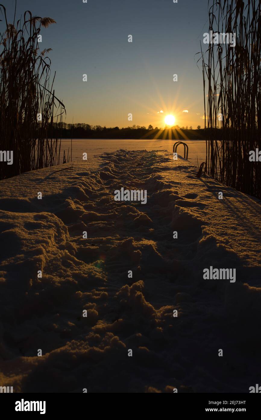 Sonnenuntergang im Schnee Foto Stock