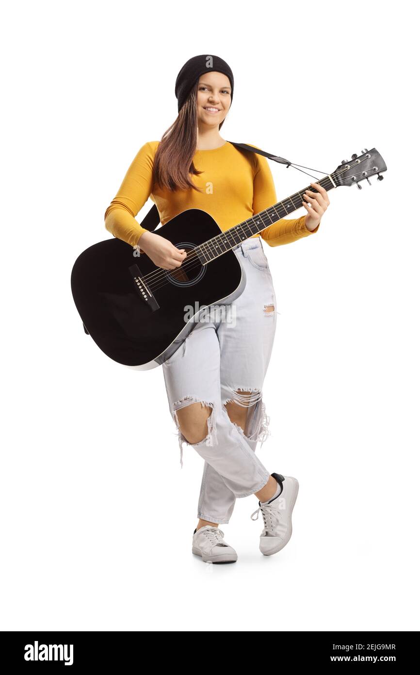Ritratto a lunghezza intera di una femmina teen con un acustico chitarra isolata su sfondo bianco Foto Stock