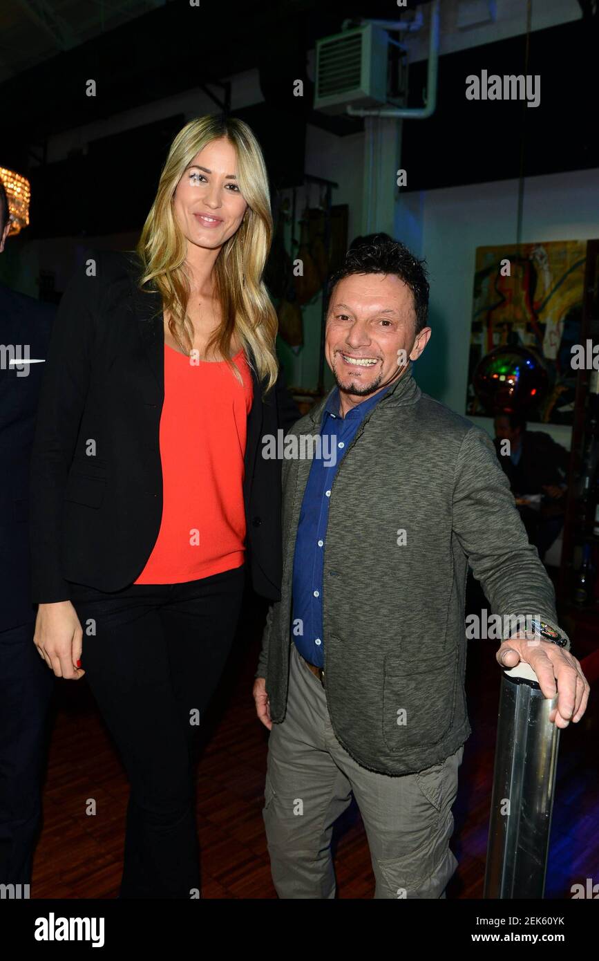 Foto Repertorio, Italia. 23 Feb 2021. 2/23/2021 - Milano, Roialto Cafè, evento 'Go & Fun Team Moto GP Gresini'. Nella foto: Elena Santarelli e Fausto Gresini (Milano - 2013-03-13, Simone Comi/IPA) ps la foto può essere utilizzata nel rispetto del contesto in cui è stata scattata, e senza l'intento diffamatorio del decoro delle persone rappresentate solo utilizzo editoriale (Foto di IPA/Sipa USA) Credit: Sipa USA/Alamy Live News Foto Stock