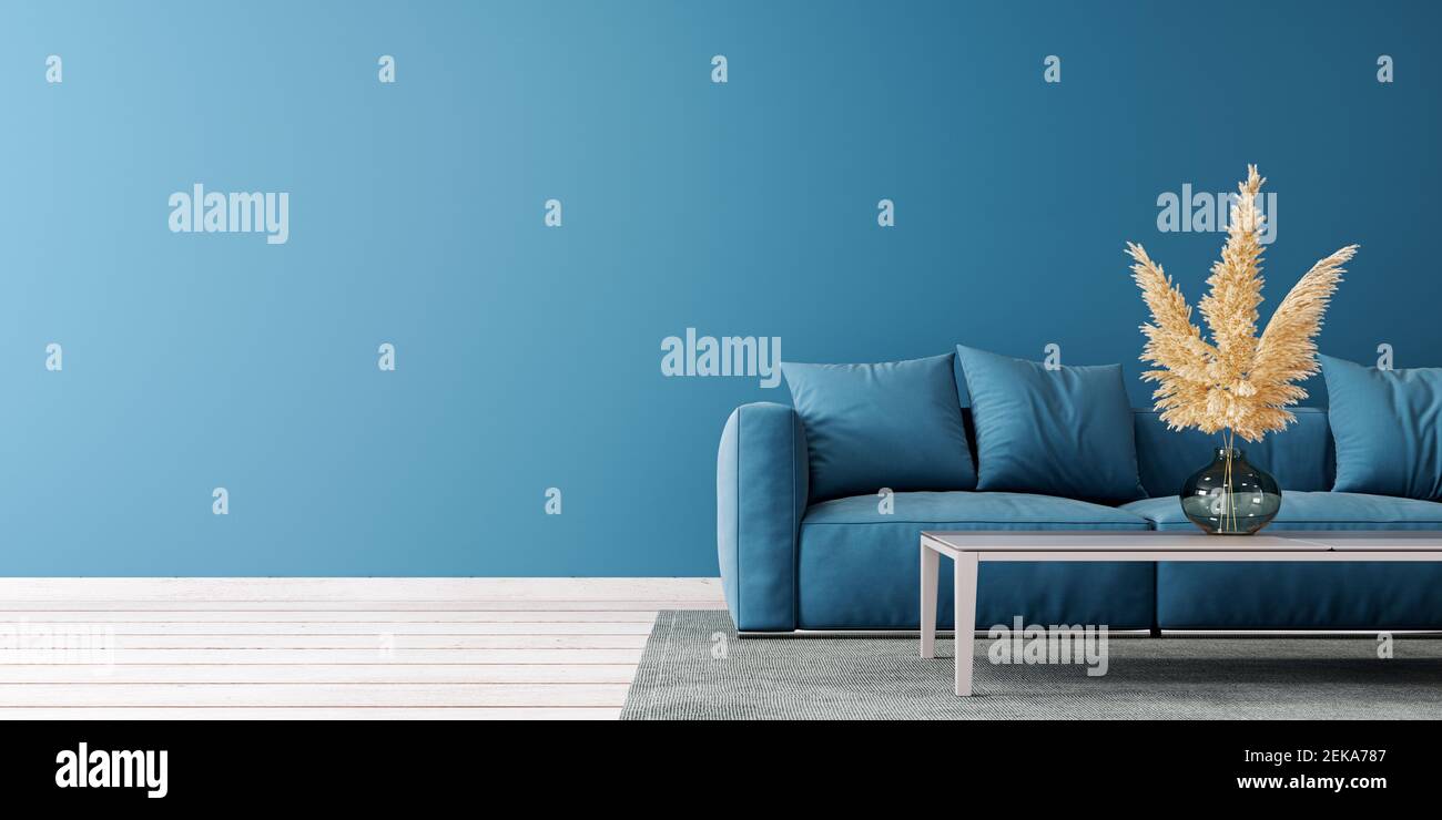 Design moderno del soggiorno con parete blu vuota e divano blu 3D rendering, illustrazione 3D Foto Stock