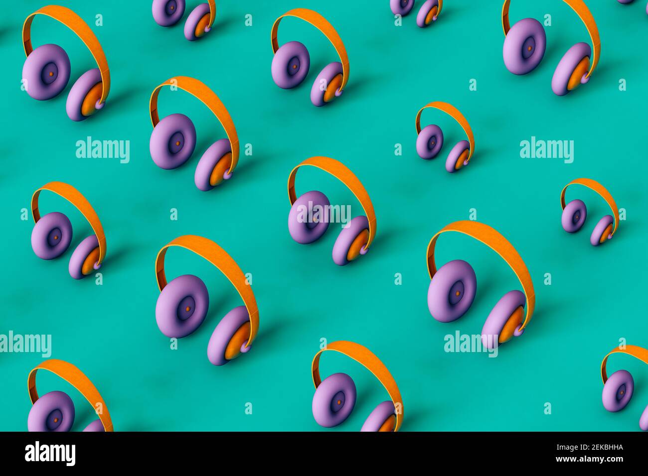 Cuffie grandi e piccole su sfondo verde Foto Stock