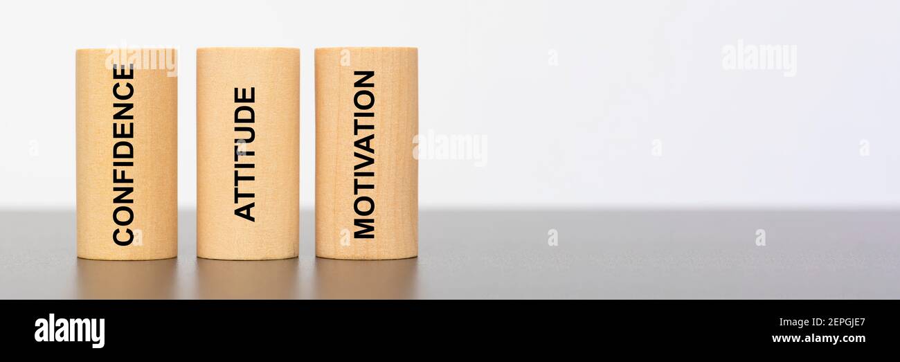 tre pilastri stampati con sicurezza, atteggiamento e motivazione Foto Stock