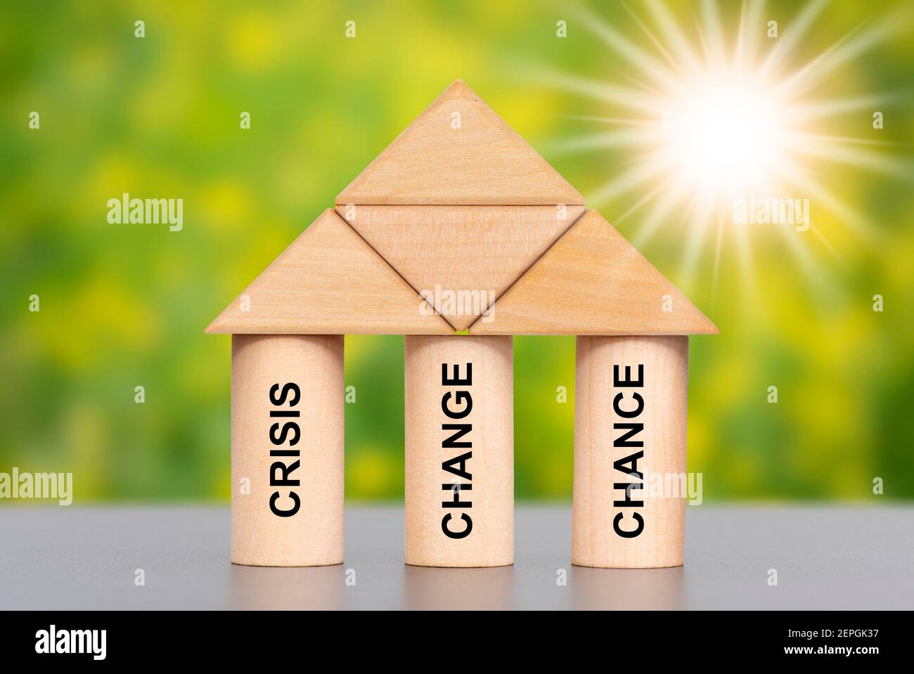 tre pilastri stampati con crisi, cambiamento e possibilità Foto Stock
