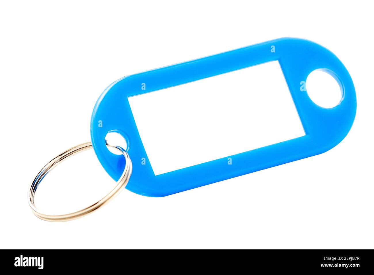 trinket di colore blu con etichetta di carta bianca. isolato Foto Stock
