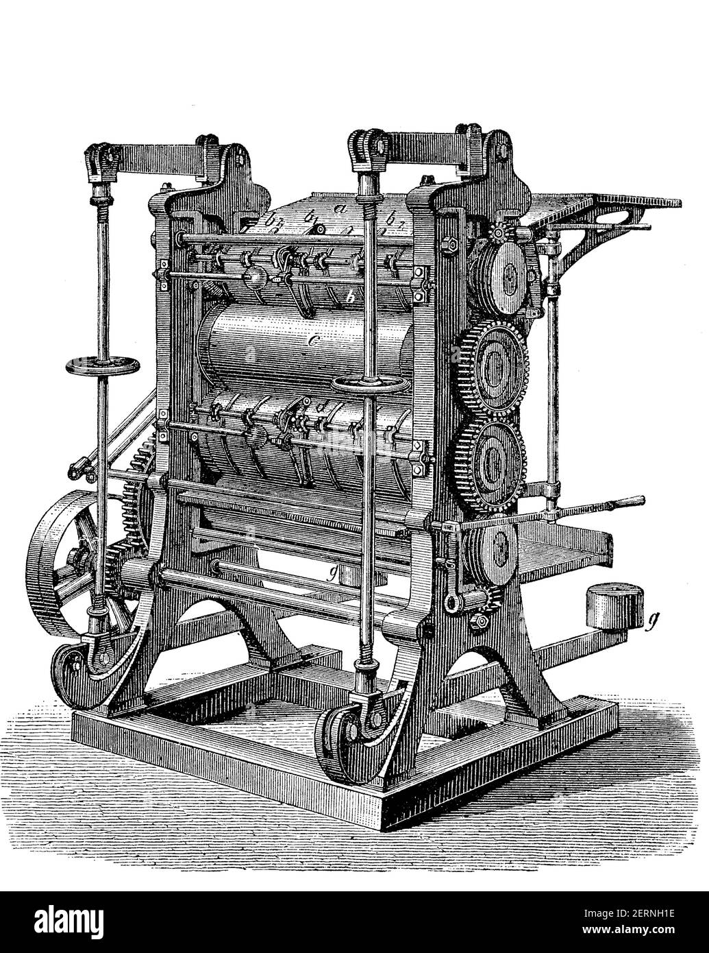 Una calandra è una serie di rulli di pressione duri utilizzati per rifinire o levigare un foglio di materiale come carta, tessuti, o plastica / Kalander, ein Sy Foto Stock