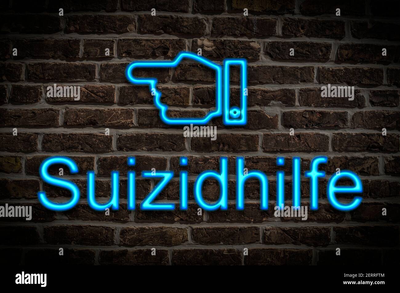 Foto di dettaglio di un cartello al neon su una parete con L'iscrizione Suizidhilfe (suicidio medicalmente assistito) Foto Stock