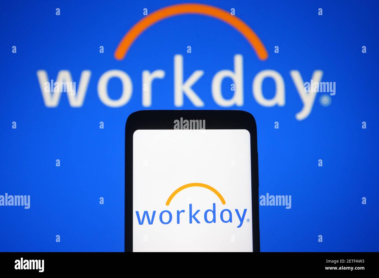 Ucraina. 2 marzo 2021. In questa illustrazione fotografica viene visualizzato un logo Workday su uno smartphone e sullo schermo del pc. Credit: Pavlo Gonchar/SOPA Images/ZUMA Wire/Alamy Live News Foto Stock