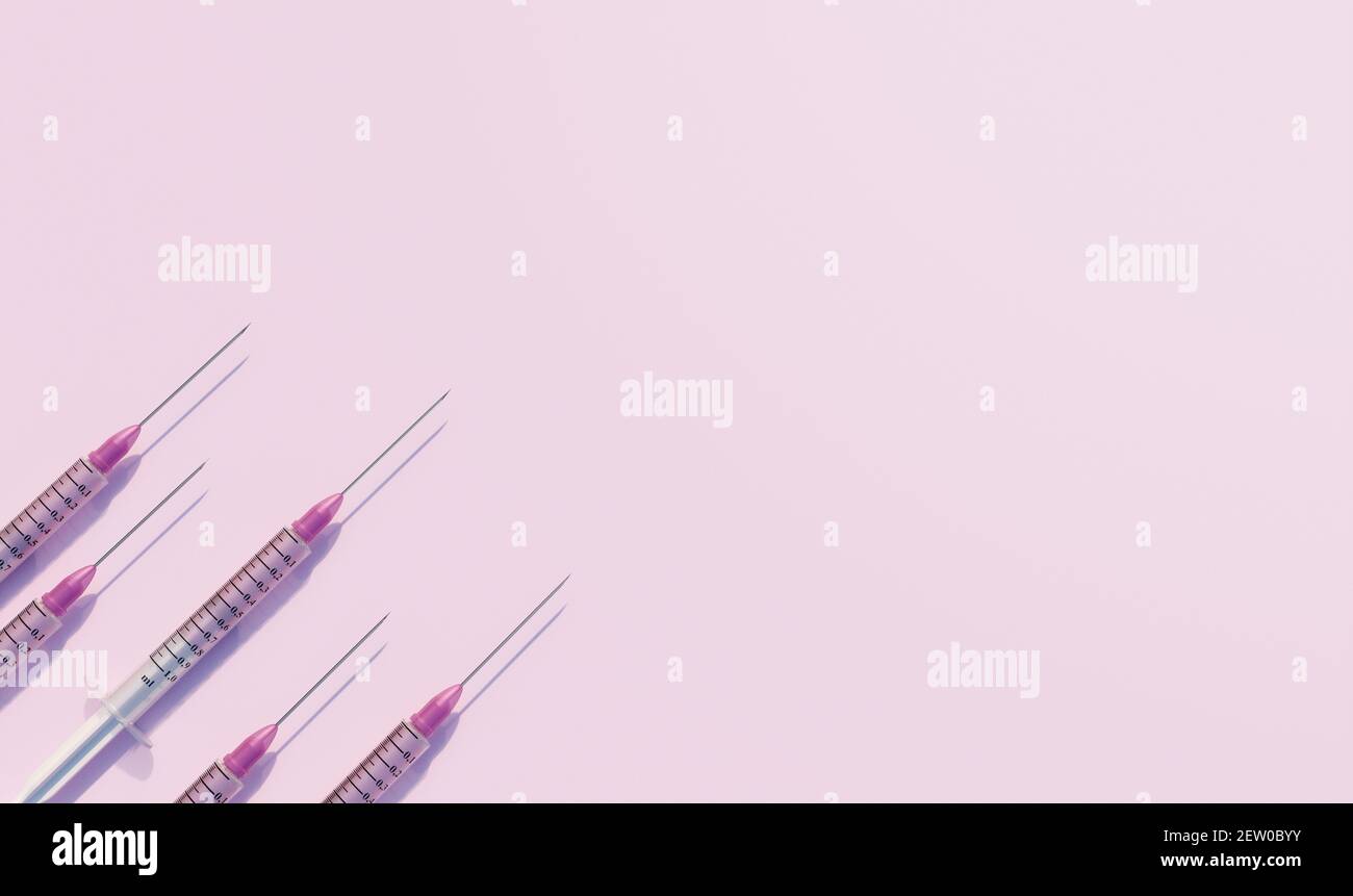 Disegno medicinale creativo da siringhe di sfondo rosa. Concetto colorato di nuovo virus Corona vaccino COVID-19. Disposizione piatta, vista dall'alto, spazio per la copia. 3d Foto Stock