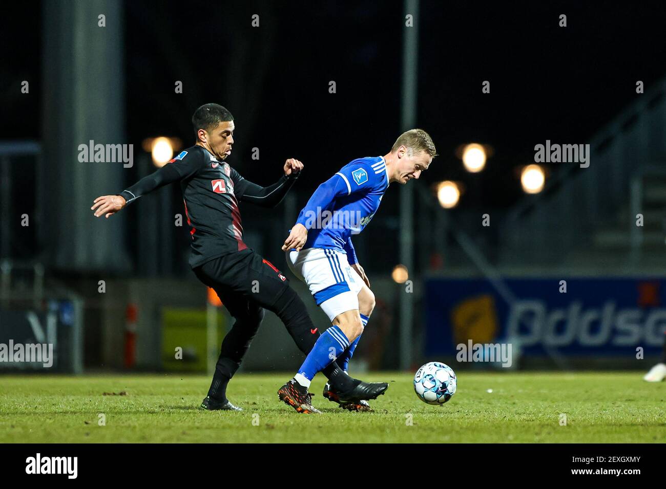 Kongens Lyngby, Danimarca. 4 Marzo 2021. Evander Ferreira (10) del FC Midtjylland e Marcel Romer (30) di Lyngby Boldklub visto nella partita 3F Superliga tra Lyngby Boldklub e FC Midtjylland al Lyngby Stadion di Kongens Lyngby, Danimarca. (Photo Credit: Gonzales Photo/Alamy Live News Foto Stock