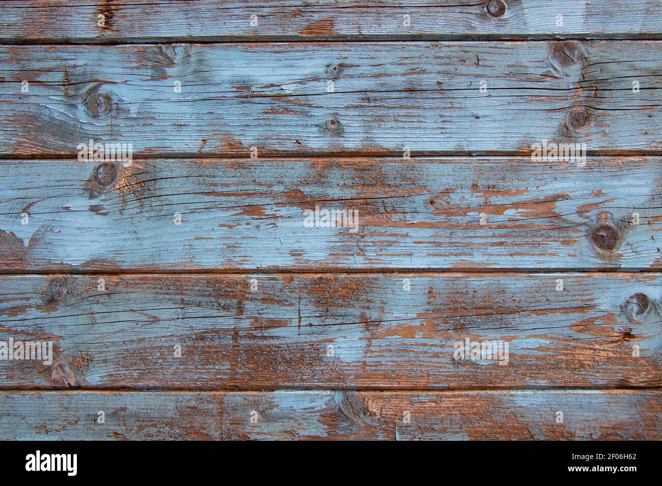 Vecchia tessitura di tavola di legno intemperie con vernice blu chiaro per sfondo con spazio di copia Foto Stock