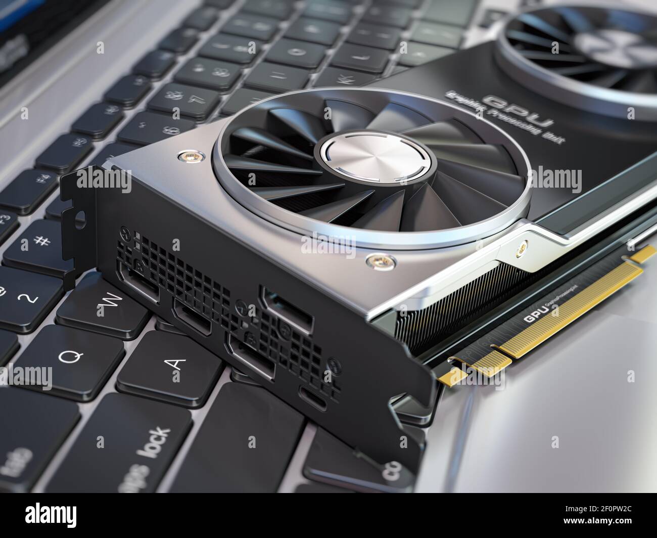 Scheda grafica sulla tastiera del computer portatile. Moderne unità di elaborazione grafica GPU per giochi. illustrazione 3d Foto Stock
