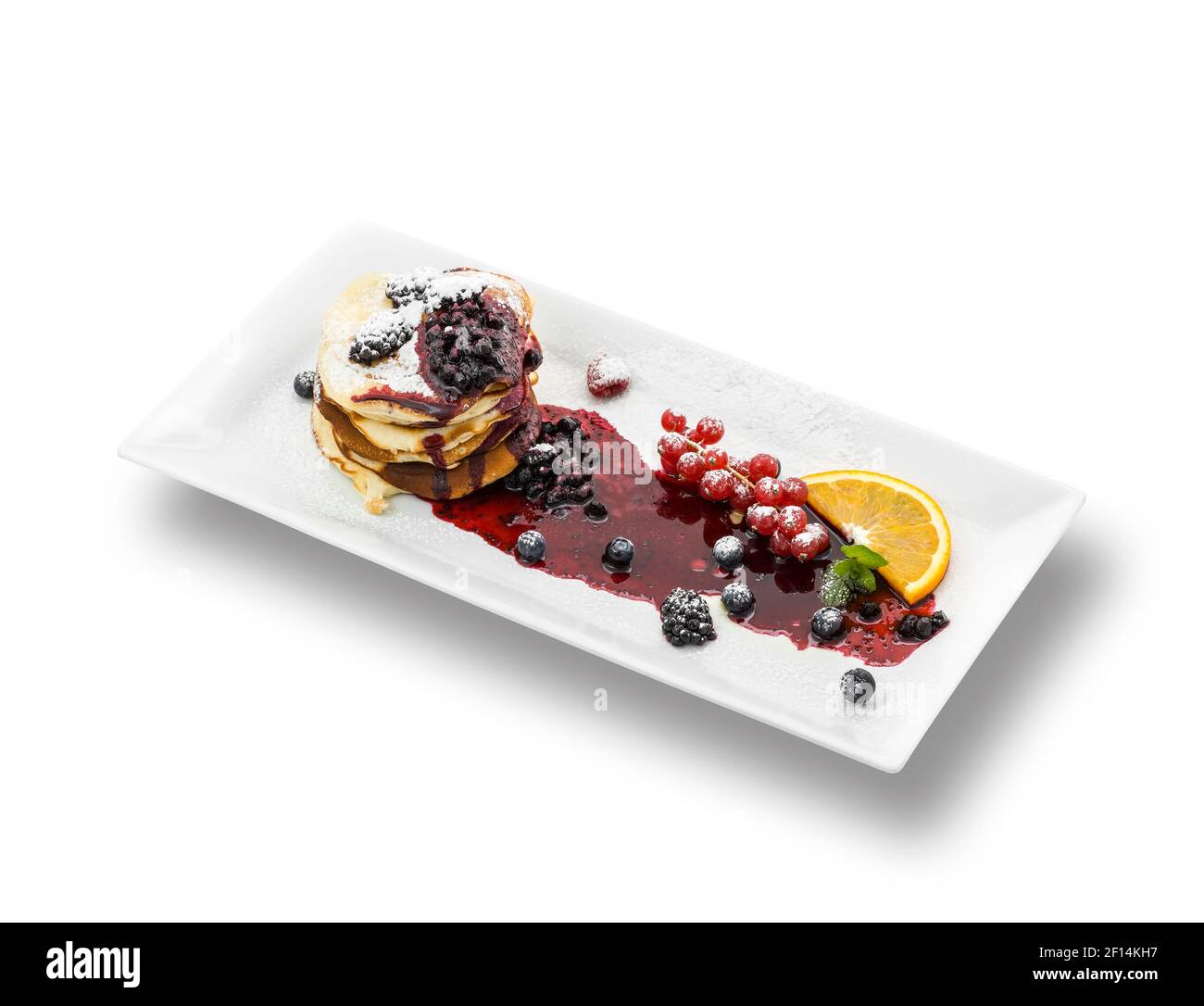 Pancake con sciroppo e bacche Foto Stock