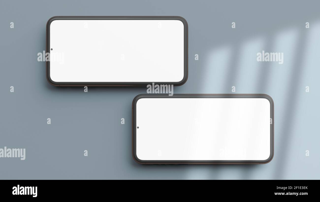 Due telefoni cellulari orizzontali sono isolati su uno sfondo blu in modalità flat lay e rendering 3D. Modello realistico di telaio cellulare e display vuoto Foto Stock