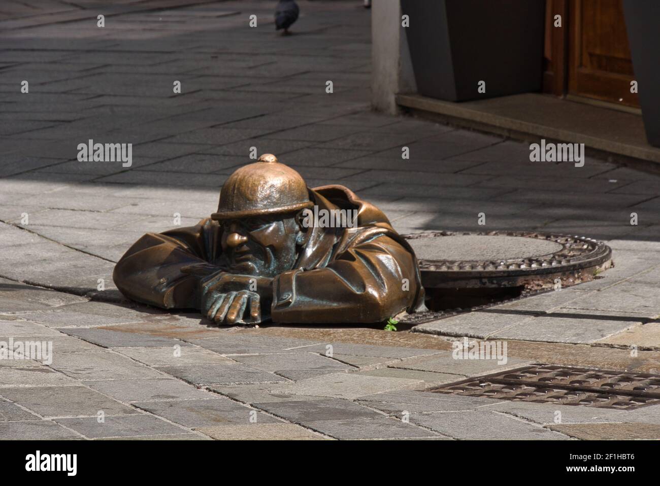 Cumil uomo al lavoro scultura, Bratislava Foto Stock