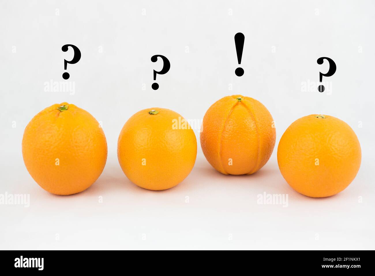 Osare essere diverso (illustrato con arance) Foto Stock