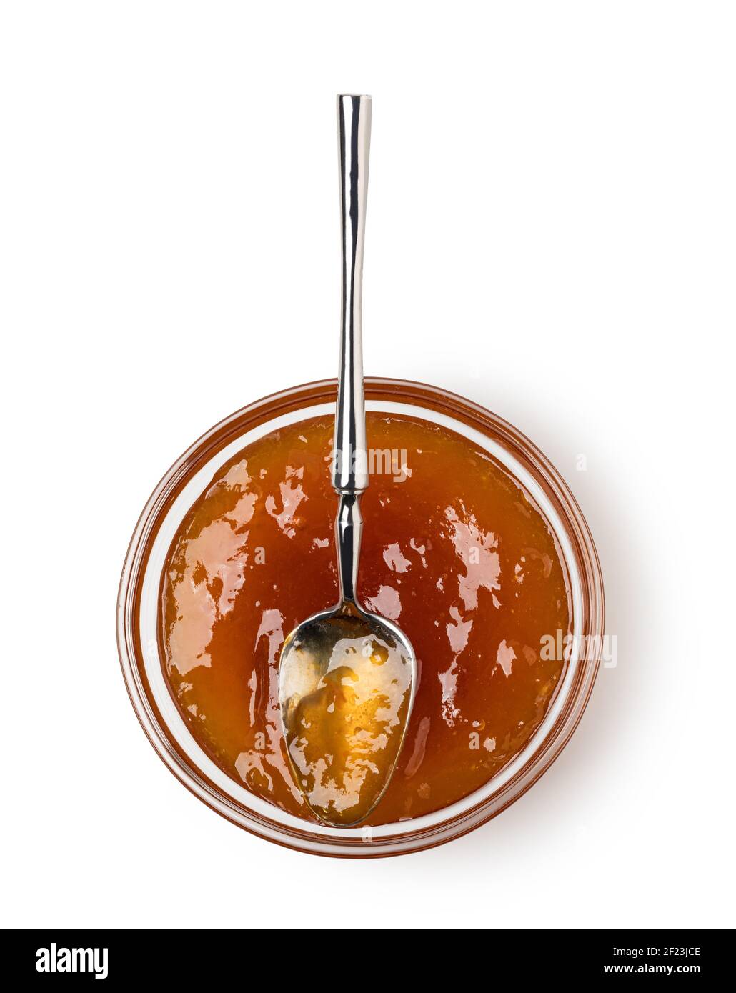 Cucchiaio sul piatto con marmellata Foto Stock