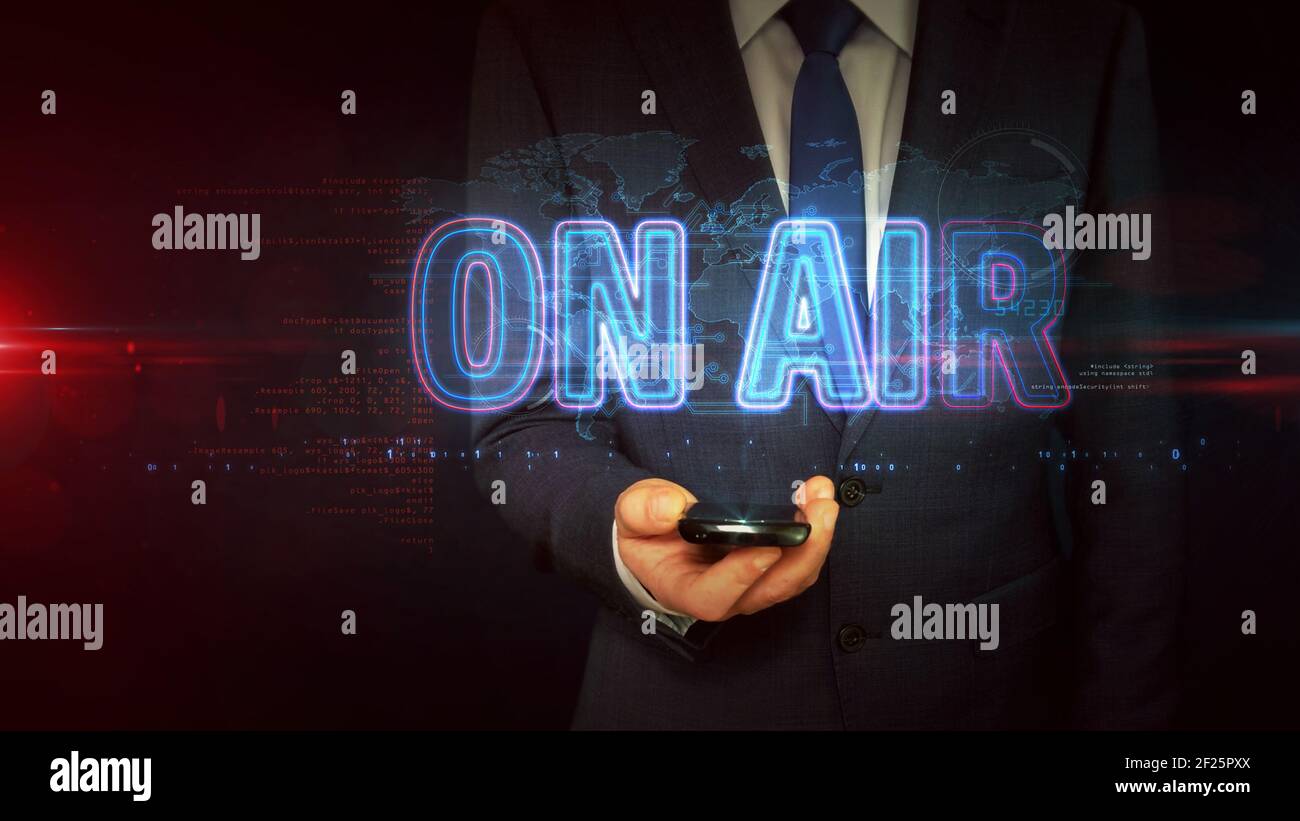 On air radio concetto di segno neon, trasmissione televisiva, media e produzione di musica da studio. Uomo d'affari tocca il display ologramma in mano. Futuristico li Foto Stock On air radio concetto di segno neon, trasmissione televisiva, media e produzione di musica da studio. Uomo d'affari tocca il display ologramma in mano. Futuristico li Foto Stock