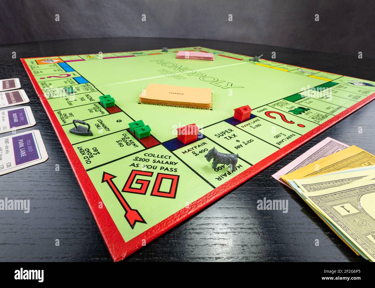 Passare andare su un consiglio di monopolio Foto Stock