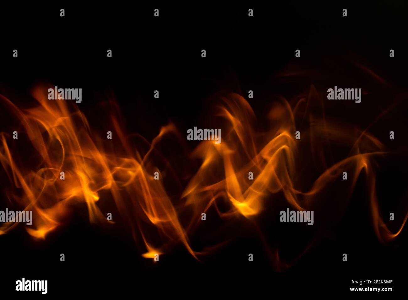 Vista astratta del fuoco e delle fiamme nel pattern delle onde Foto Stock