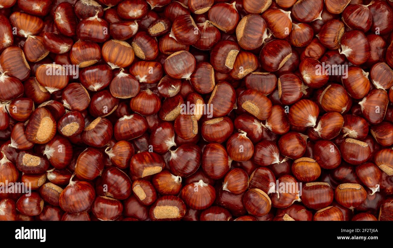 Dolce Chestnuts sfondo per lo sfondo. Piatto di castagno Foto Stock
