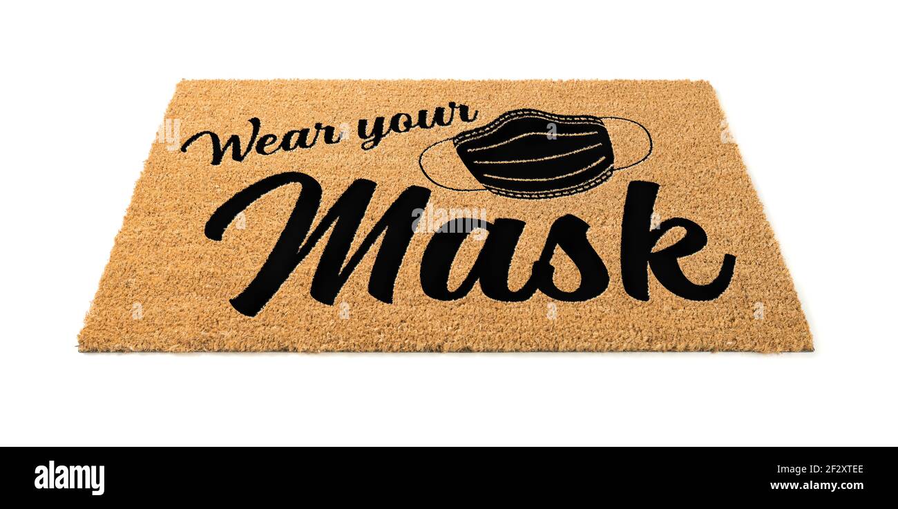 Indossare la maschera Welcome Door Mat isolato su sfondo bianco. Foto Stock