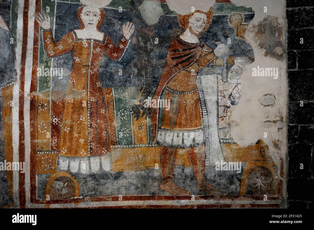 Uomo in seguito canonizzato come San Giuliano l'Ospitaliero pugnala i suoi genitori a letto mentre sua moglie alza le mani in orrore. Affresco tardo medioevale nella Chiesa di Santa Maria del Tiglio, una chiesa comasco-romanica costruita nel XII secolo a Gravedona in Lombardia. Foto Stock